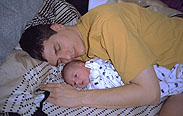 Mika, asleep with Daddy