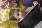 Reading in mom+dad's bed