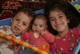 squeezed between siblings